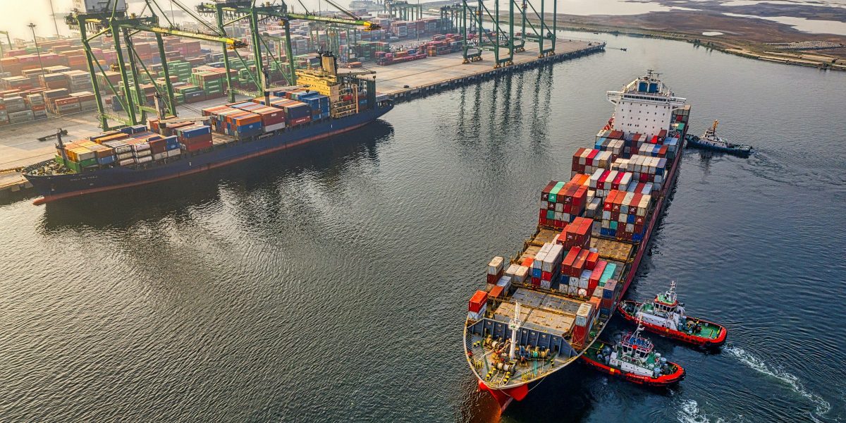 Ships with containers near a dock